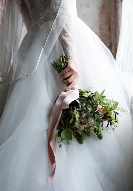 Attractive Beautiful Bride Holding Flowers Bouquet