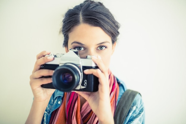 Attractive brunette taking a photo