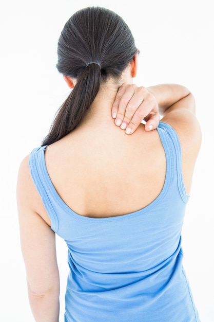 Attractive brunette with neck pain 