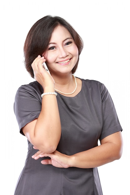 Attractive business woman using a mobile phone