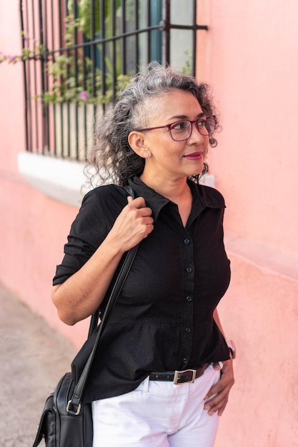 Attractive Business Woman Walking Down The Street