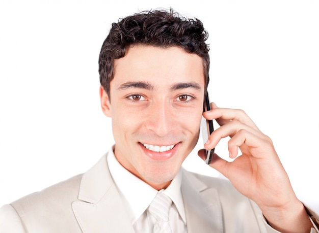 Attractive businessman talking on phone 