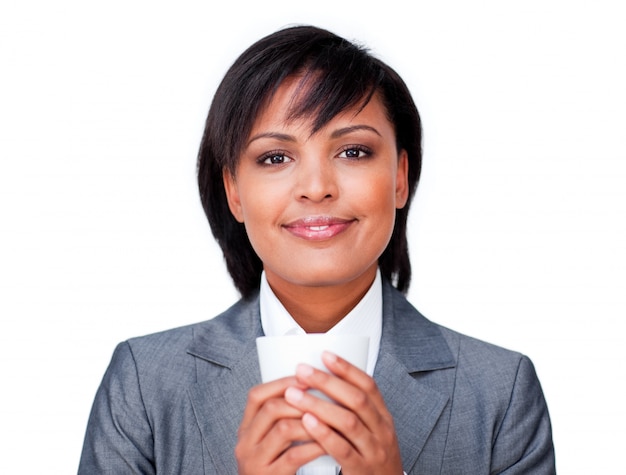 Attractive businesswoman drinking a coffee