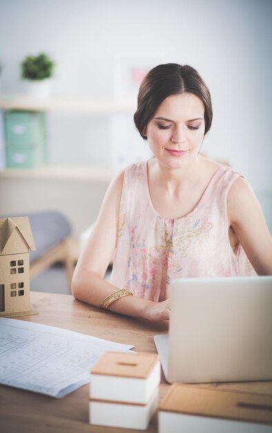 Attractive businesswoman sitting in the office businesswoman