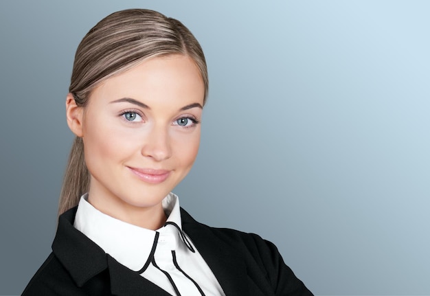 Attractive businesswoman with her arms crossed