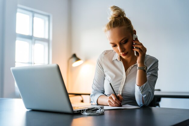 attractive businesswoman working in an office