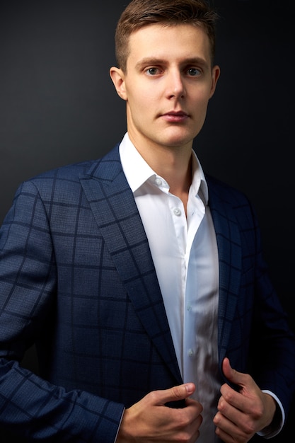 Attractive caucasian man in formal stylish suit