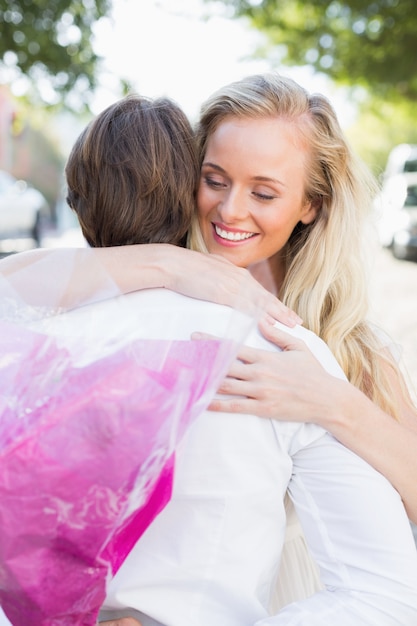 Attractive couple hugging each other