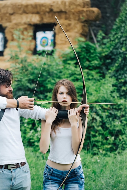 Attractive couple shoots out of the bow