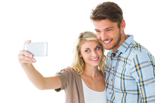 Attractive couple taking a selfie together