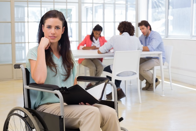 Attractive disabled businesswoman at work