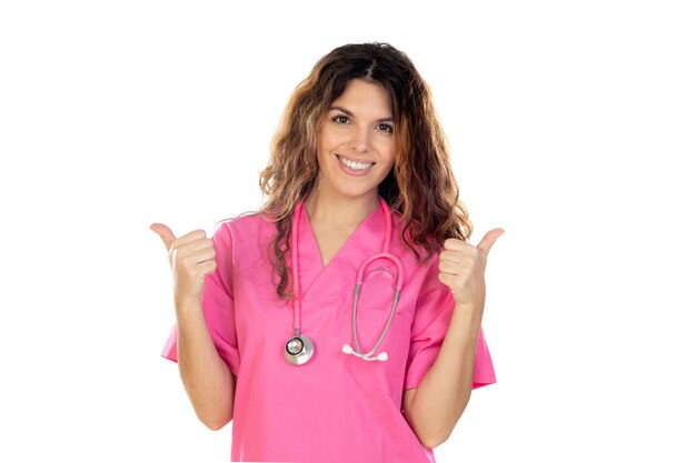 Attractive doctor wearing a pink uniform isolated on a white background