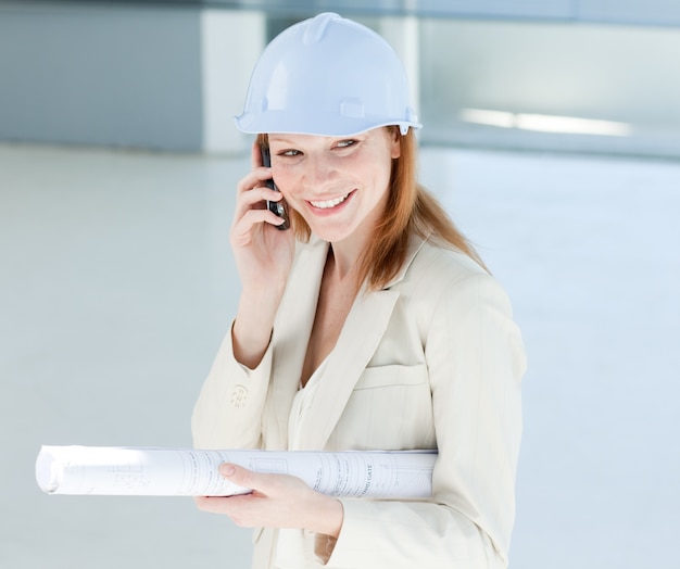 Attractive engineer on phone