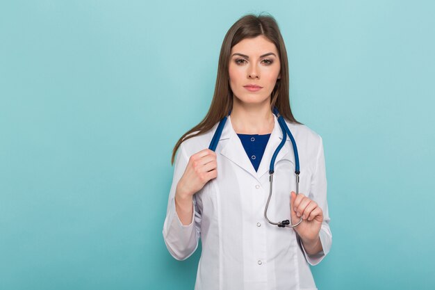 Attractive female doctor in white coat