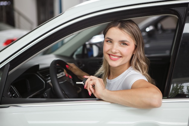 Attractive female driver smiling