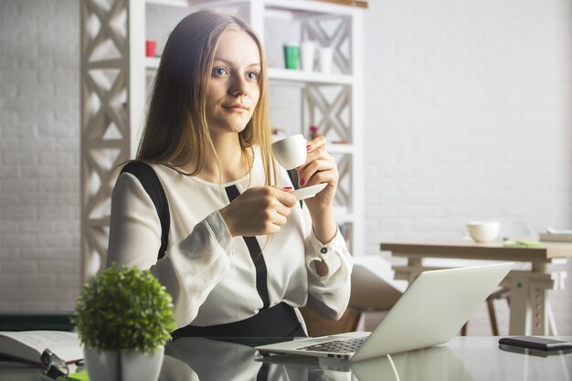 Attractive girl in office