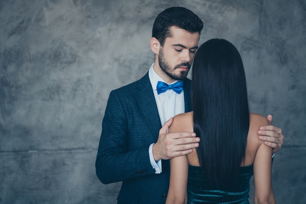 Attractive glamorous couple posing together