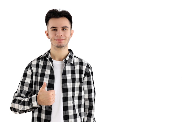 Ragazzo attraente in camicia su sfondo bianco