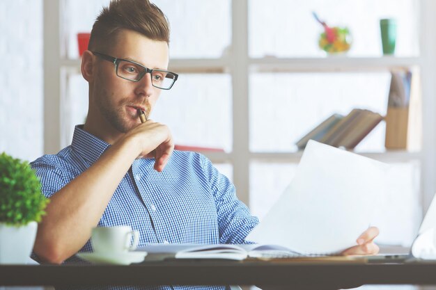 Attractive guy with document