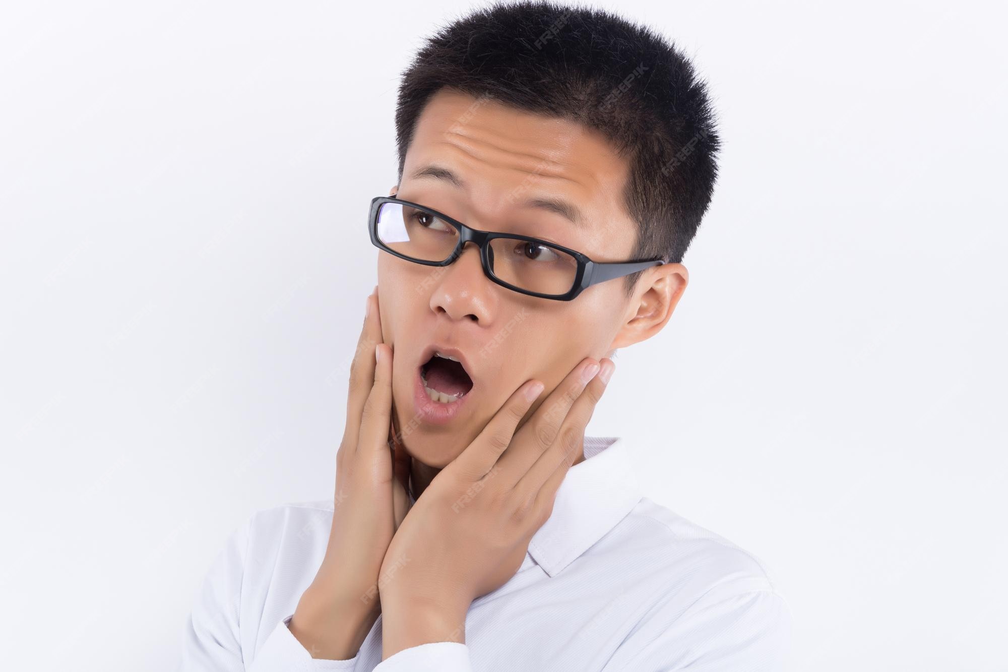 Premium Photo Attractive handsome shock surprise nerd man close up