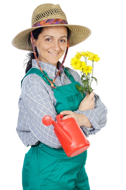 Attractive happy woman dressed gardener 