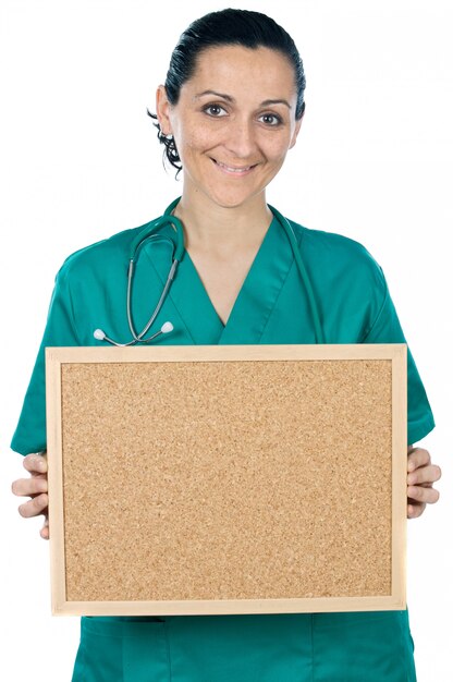 Attractive lady doctor over a white background