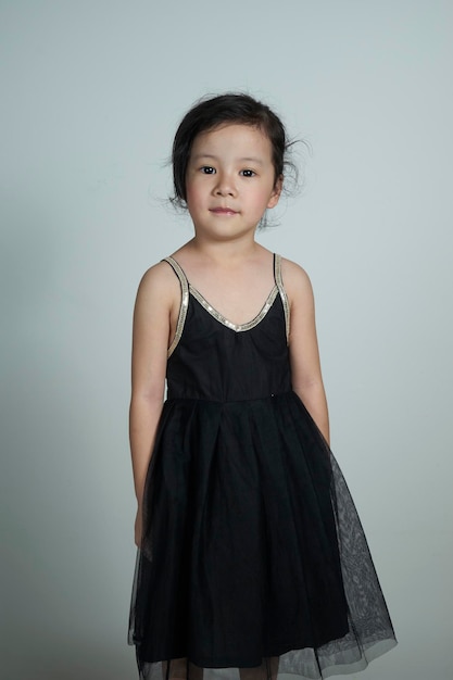 Attractive little cute fashion model posing