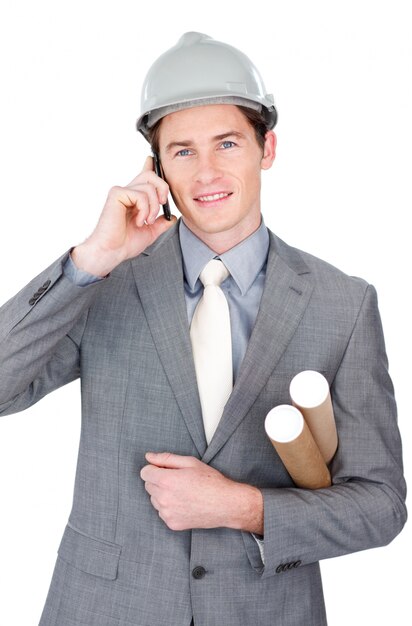 Attractive male architect talking on phone 