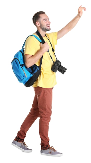 Attractive male tourist on white background