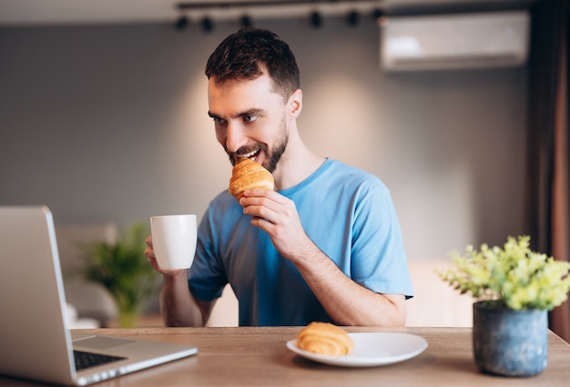 Attractive male working from home