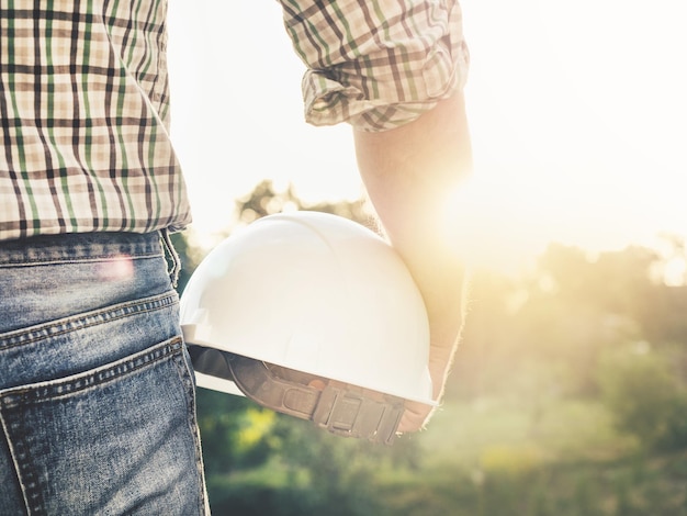 Attractive man holding tools in his hands