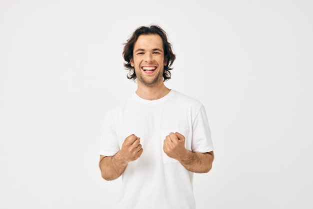 Attractive man in a white tshirt hand gesture lifestyle unaltered