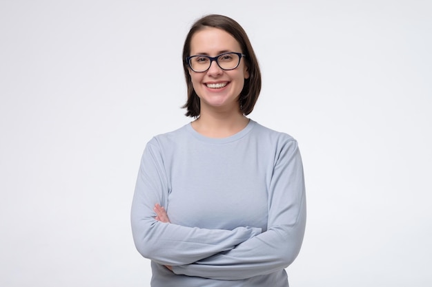 Attractive mature woman looking at camera and smiling