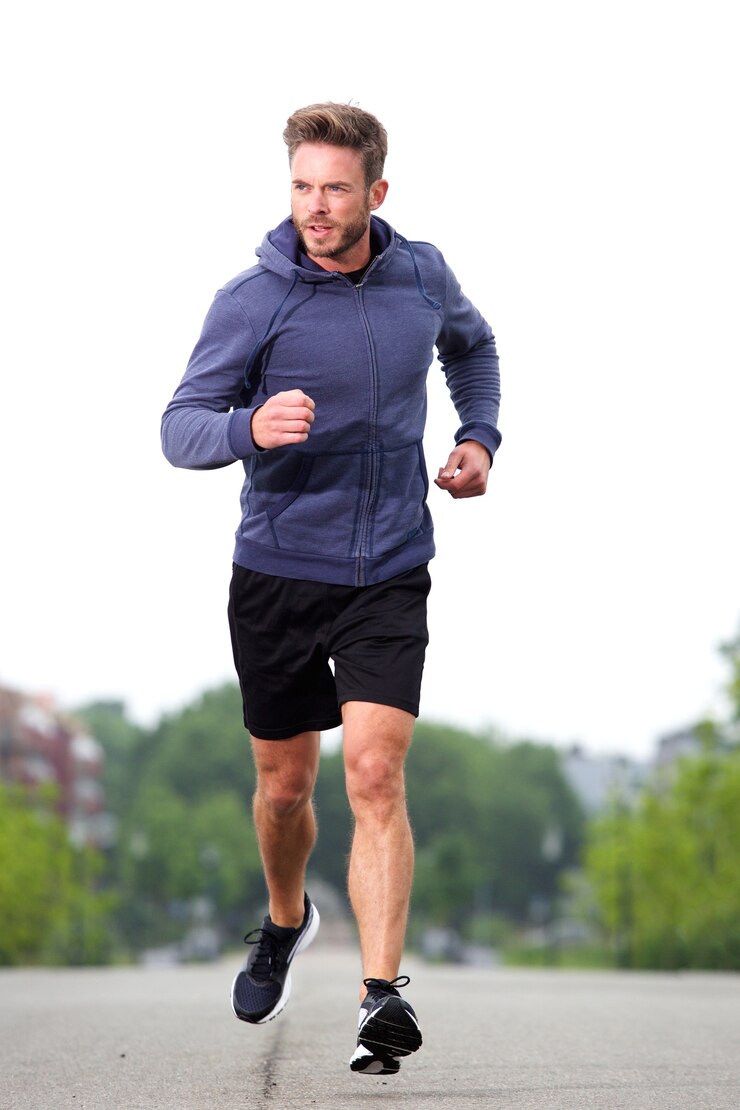 Photo attractive older jogger training in street