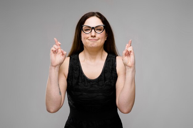 Attractive overweight woman in eyeglasses