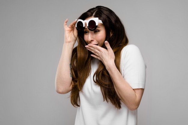 Attractive overweight woman in sunglasses