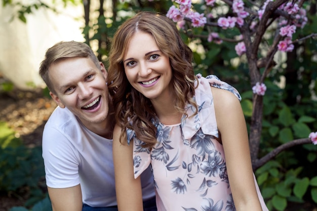 Attractive positive couple toothy smiling at camera