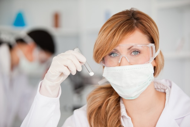 Attractive scientist woman looking at the camera