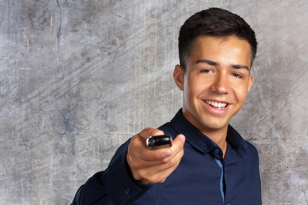 Attractive teenage boy holding car keys