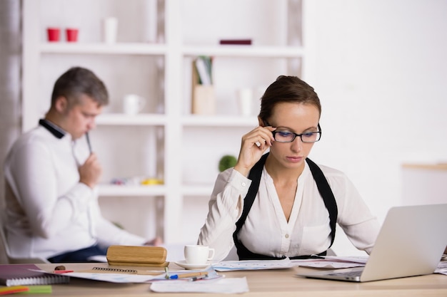 Attractive woman doing paperwork