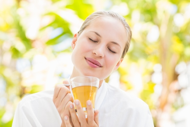 Attractive woman drinking tea