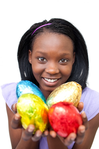 Attractive woman holding colorful Easter eggs 