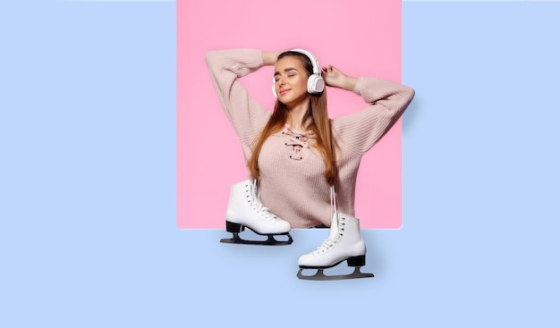 Attractive woman holding ice skates