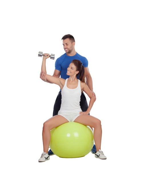 Attractive woman and a personal trainer