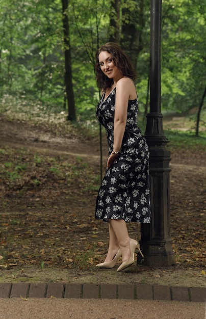 Attractive woman posing in public park