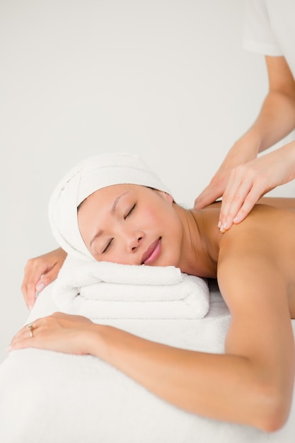 Attractive woman receiving back massage