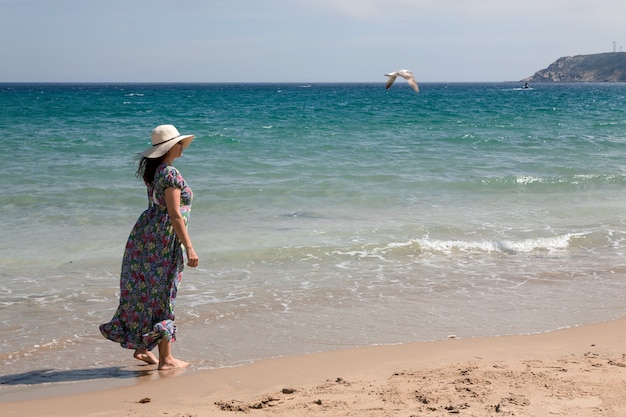 Attractive woman on seashore 