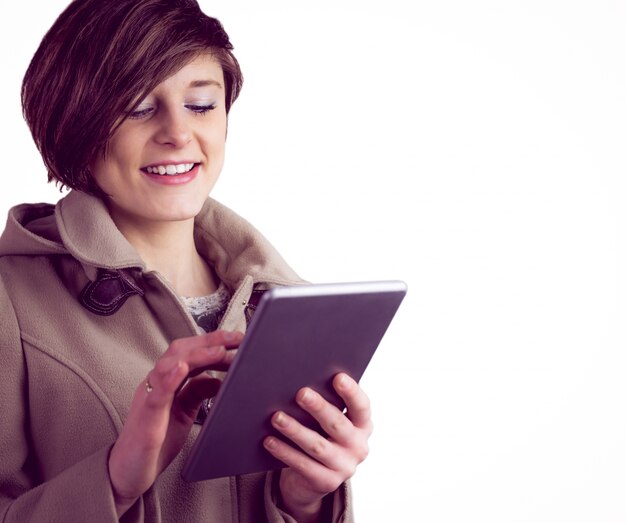 Attractive woman using her tablet pc