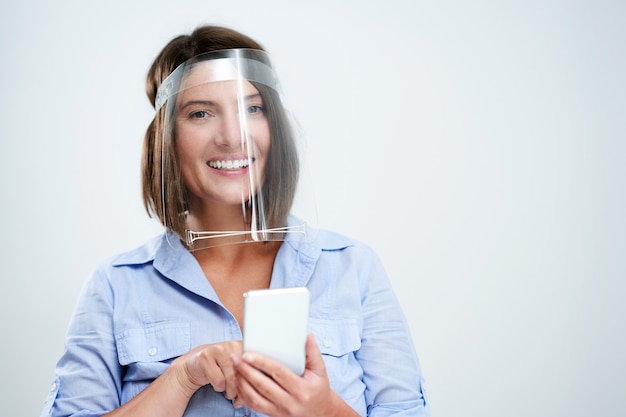 attractive woman wearing protective mask isolated over white background