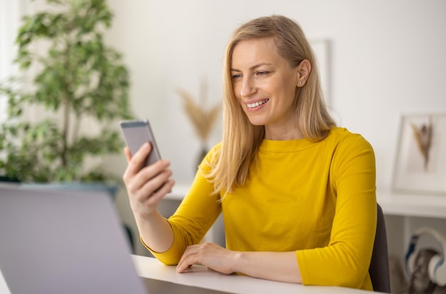 Attractive woman with blond hair having